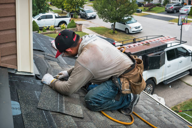 Professional Roofing technician working in Albion, RI